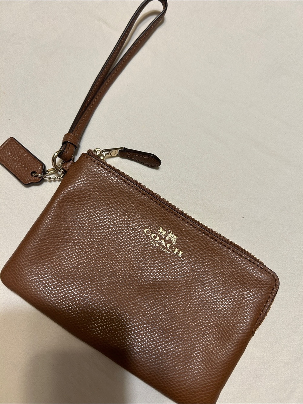 Coach Brown Textured Leather Wristlet with Gold Logo